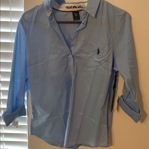 Light blue polo with tags!!